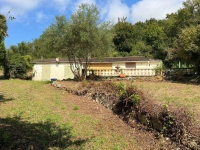 Secluded Bungalow to Renovate in a Superb Wooded Location!