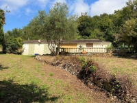 Secluded Bungalow to Renovate in a Superb Wooded Location!