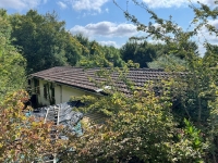 Secluded Bungalow to Renovate in a Superb Wooded Location!