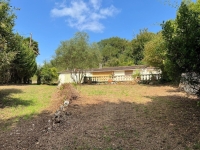 Secluded Bungalow to Renovate in a Superb Wooded Location!