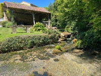 Ancien Moulin dans un Cadre Idyllique