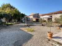 Attractive Stone Property with Gite, Swimming Pool And Outbuildings