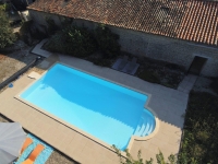 Attractive Stone Property with Gite, Swimming Pool And Outbuildings