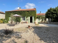 Attractive Stone Property with Gite, Swimming Pool And Outbuildings