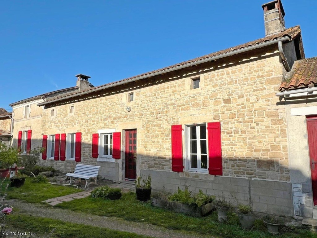 Beautiful Farmhouse with Outbuildings and Flower-filled Courtyard