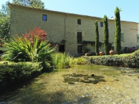 Ancien Moulin dans un Cadre Idyllique