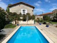Beautiful Stone House With  an Enclosed Mature Garden, Swimming pool and Three Bedrooms.