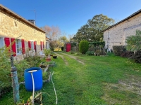 Beautiful Farmhouse with Outbuildings and Flower-filled Courtyard