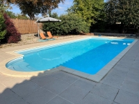 Attractive Stone Property with Gite, Swimming Pool And Outbuildings