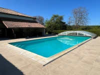 Élégante Longère en Pierre au Cœur d’un Parc Arboré avec Grande Piscine
