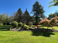 Élégante Longère en Pierre au Cœur d’un Parc Arboré avec Grande Piscine