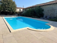 Attractive Stone Property with Gite, Swimming Pool And Outbuildings