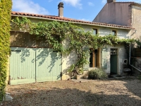 Attractive Stone Property with Gite, Swimming Pool And Outbuildings