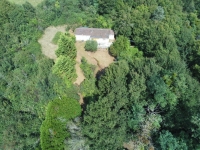 Secluded Bungalow to Renovate in a Superb Wooded Location!