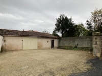 Village house comprising two independent dwellings