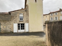 Village house comprising two independent dwellings